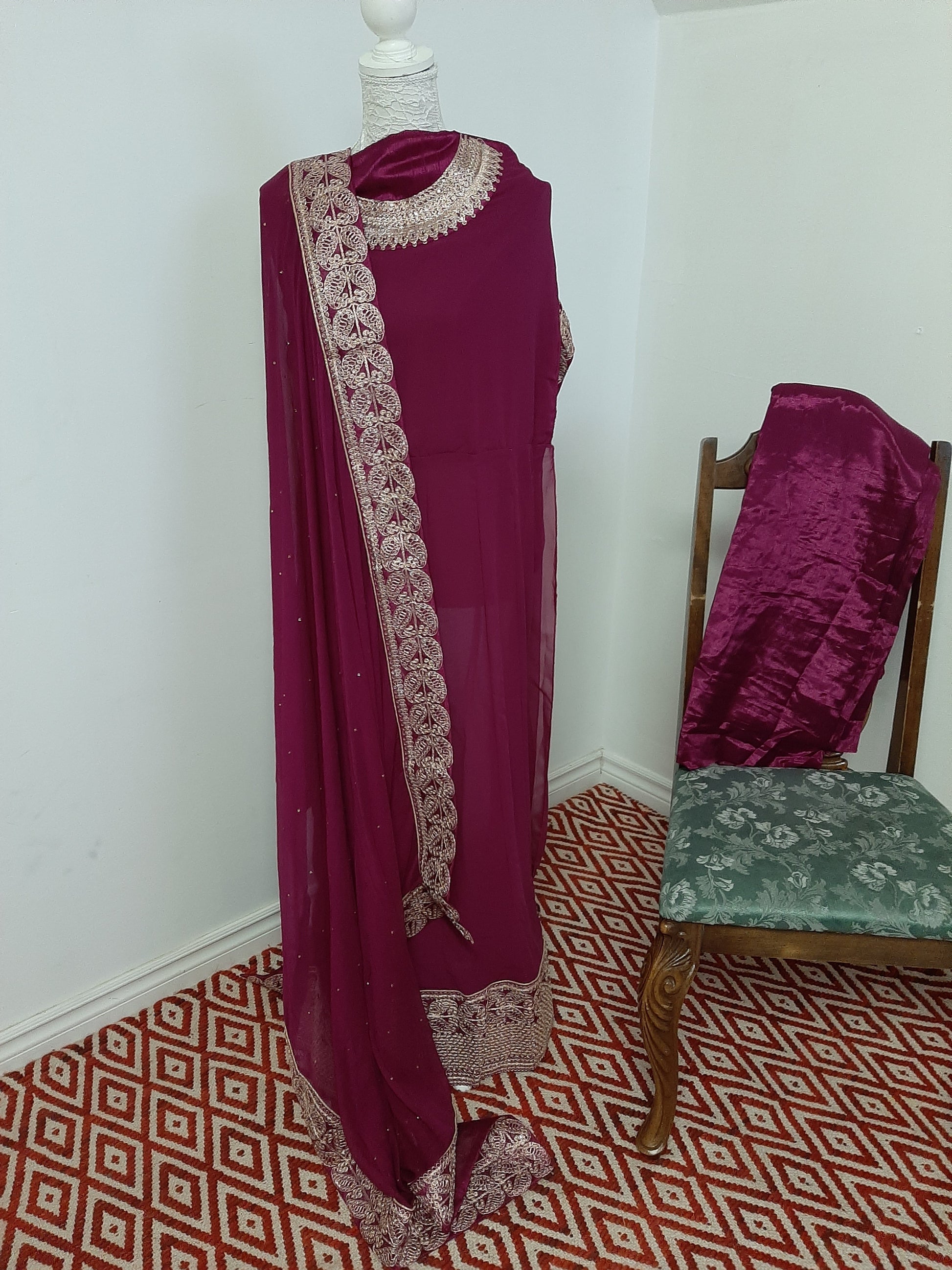 Mulberry Purple Georgette Gown with Embroidery and Stone work @ DressingStylesCA.com